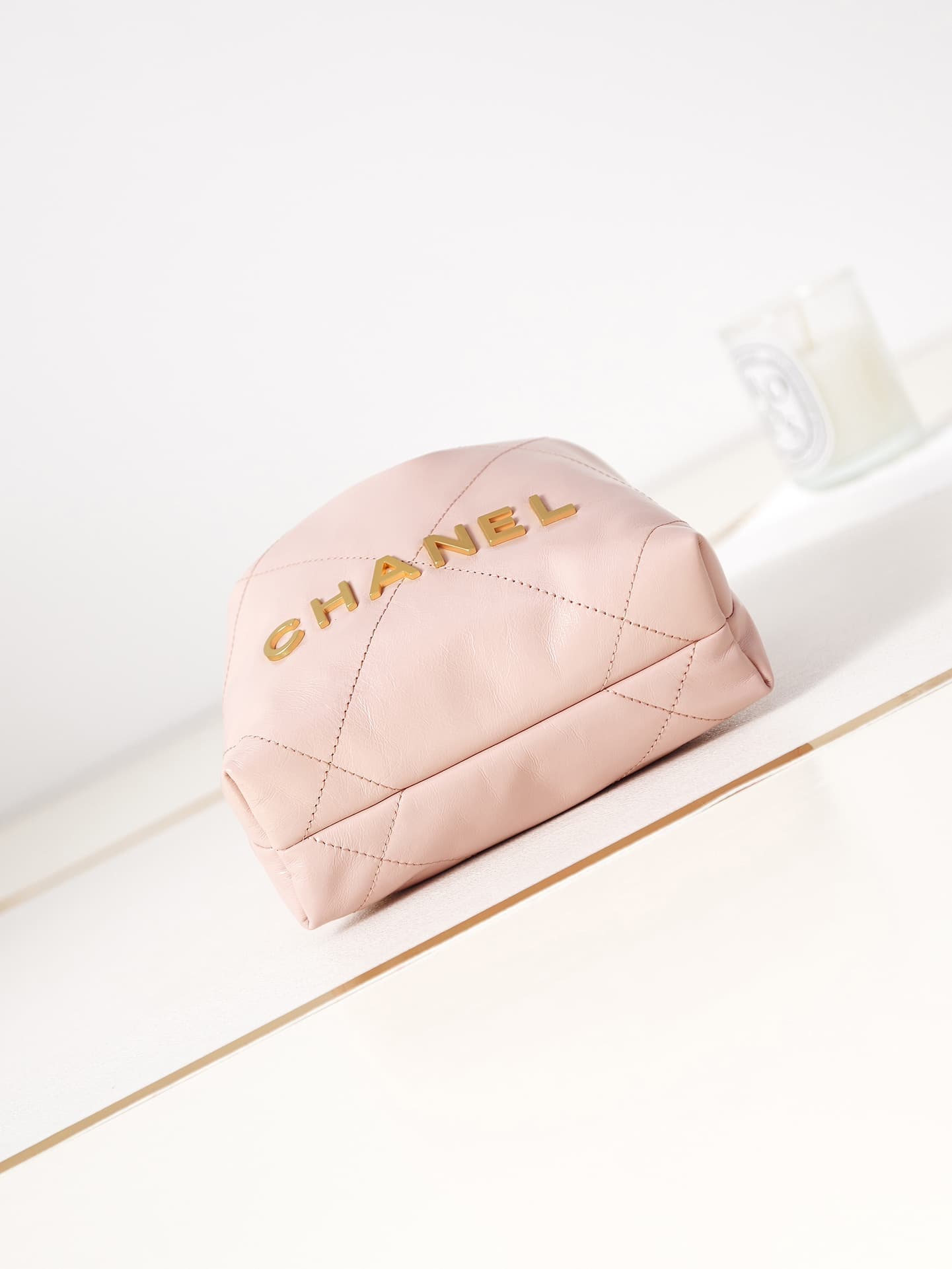 Chanel 22 MINI HANDBAG Shiny Calfskin Pink & Gold-Tone Metal AS3980 A