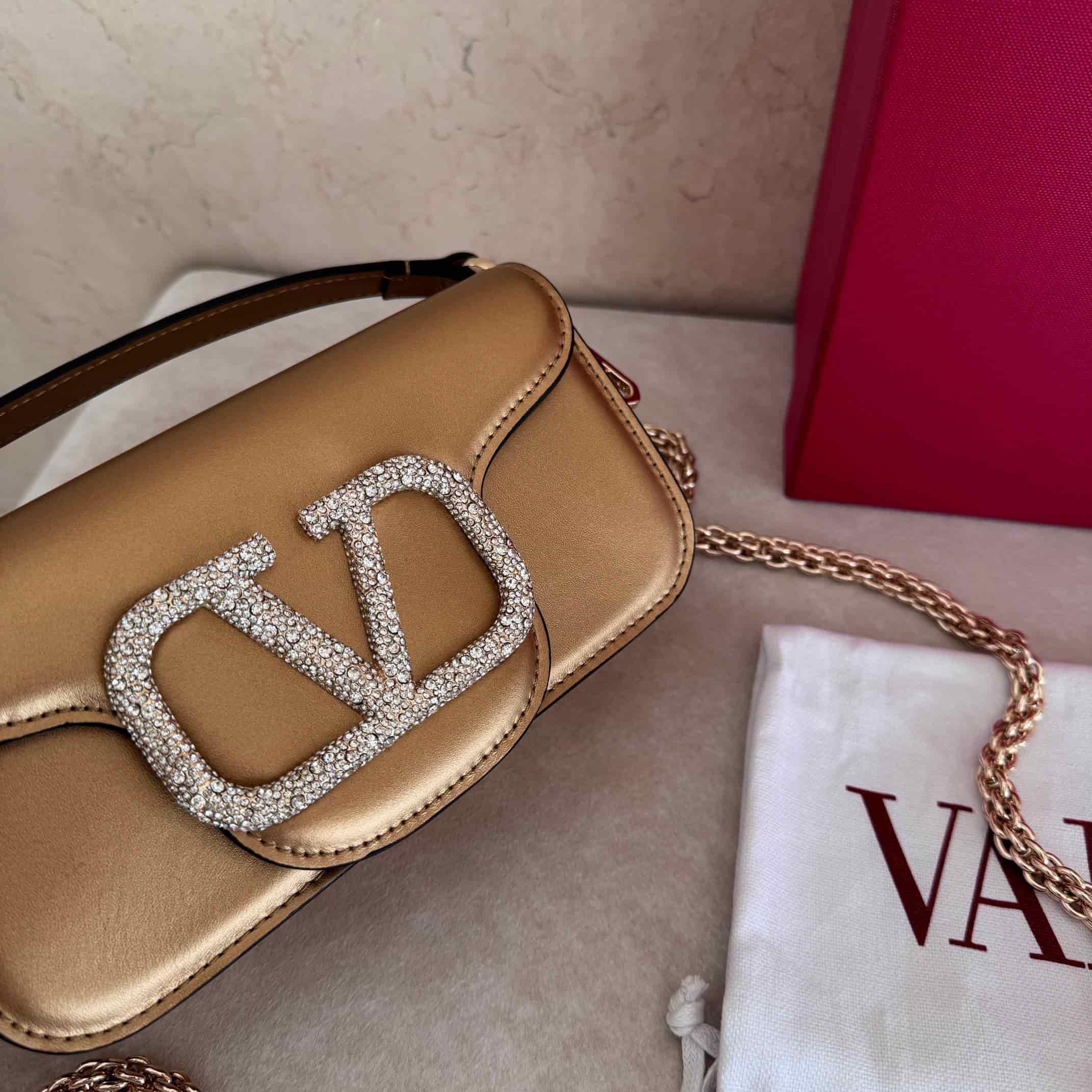 Valentino Garavani Locò Mini leather shoulder bag with crystal VLogo High