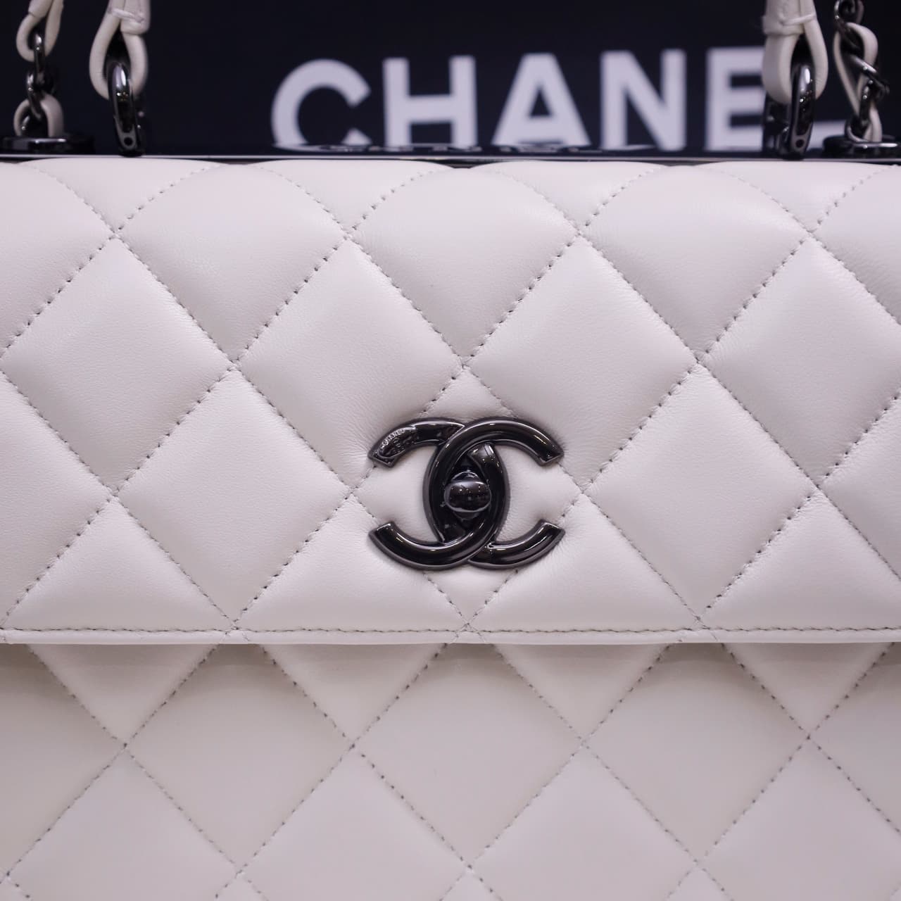 SMALL FLAP BAG WITH TOP HANDLE Lambskin Black Metal White A