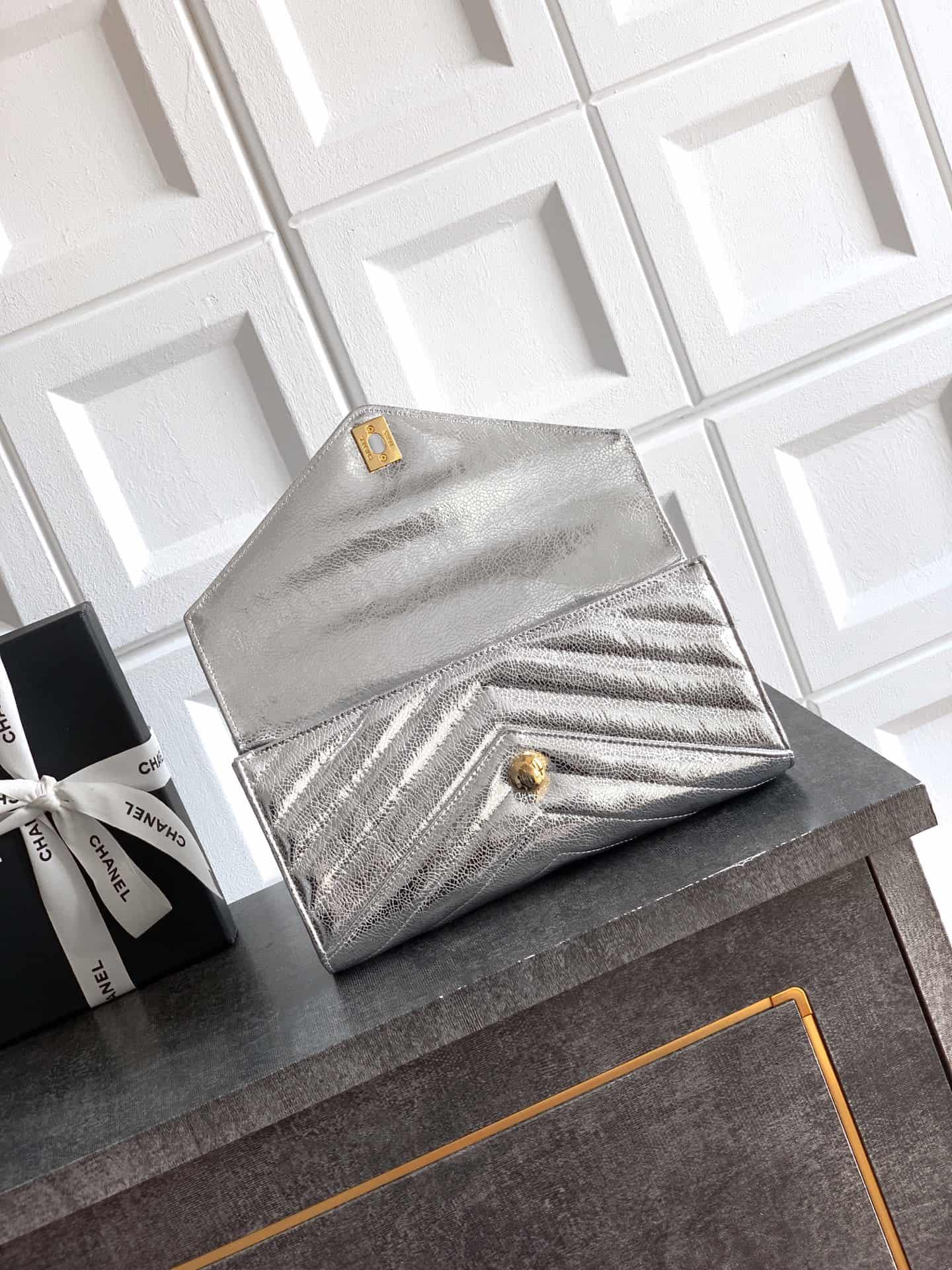 Chanel Flap Bag with Top Handle Metallic Chevron Lambskin Leather Finish& Gold-Tone Metal Silver AS6044 A