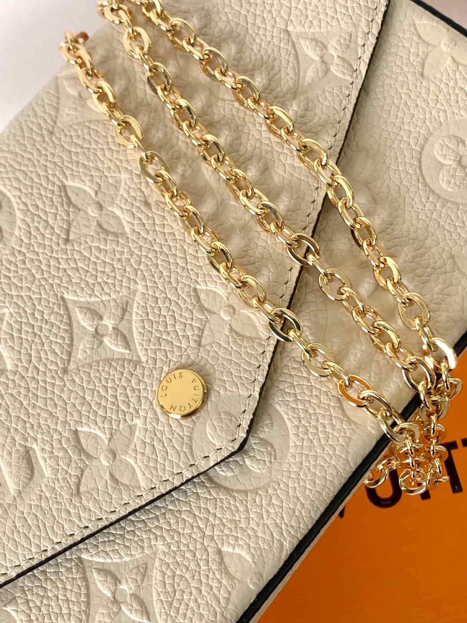 Louis Vuitton Pochette Félicie Cream Monogram Empreinte Leather M82363 High