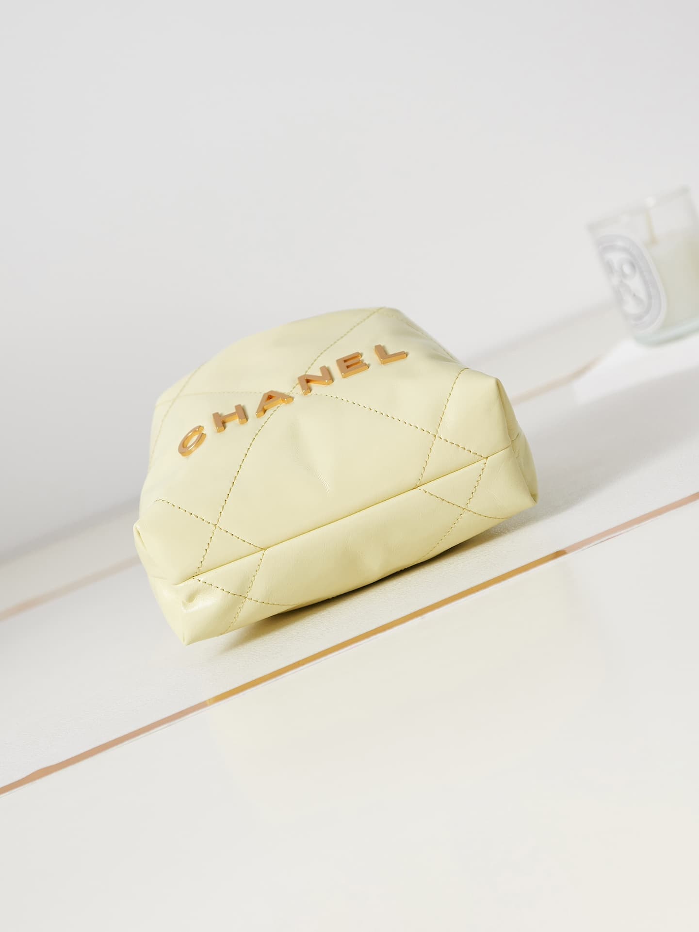 Chanel 22 MINI HANDBAG Shiny Calfskin Light Yellow & Gold-Tone Metal AS3980 A