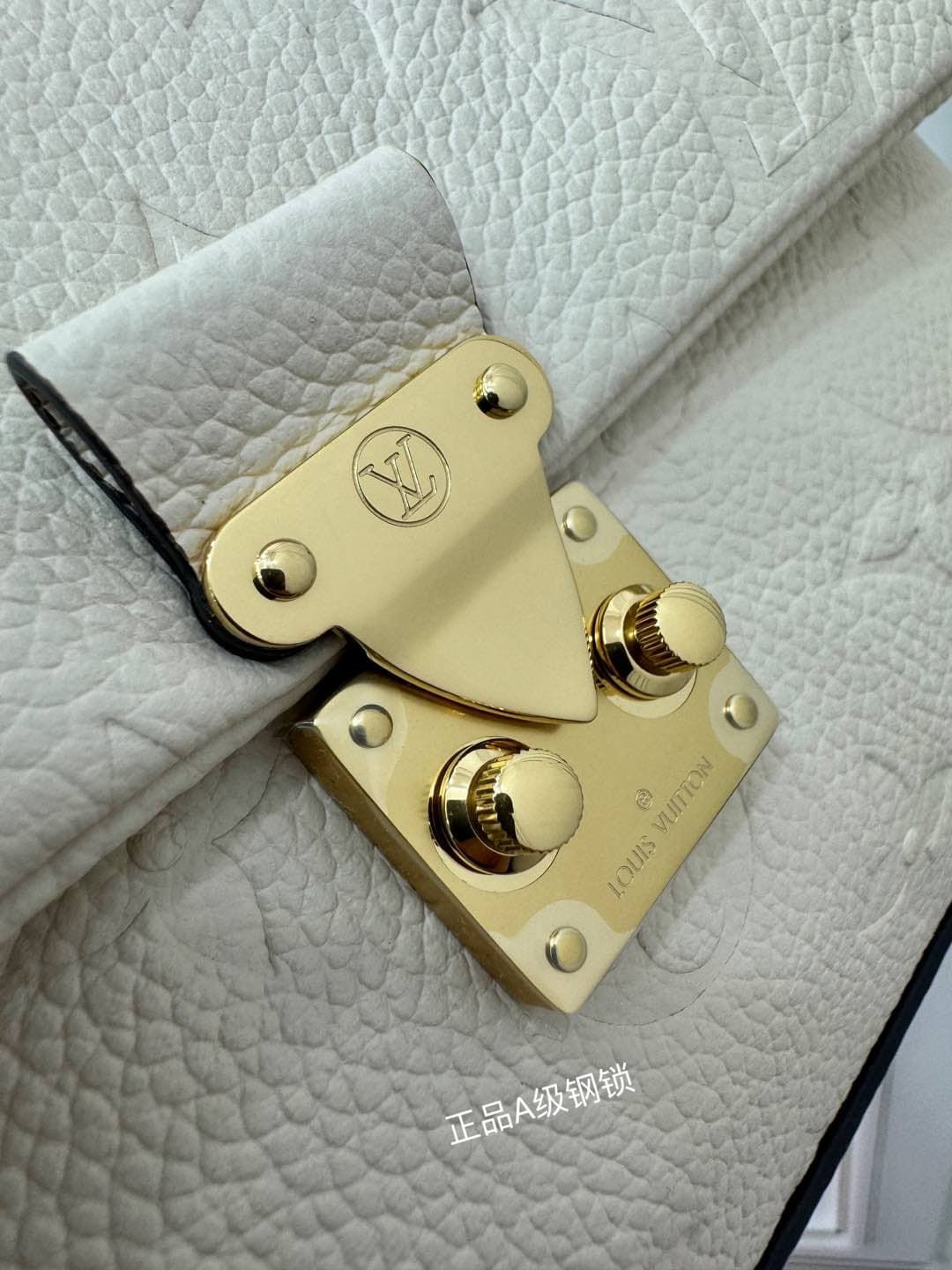 Louis Vuitton Madeleine Nano Embossed, grained cowhide leather M12145 Top