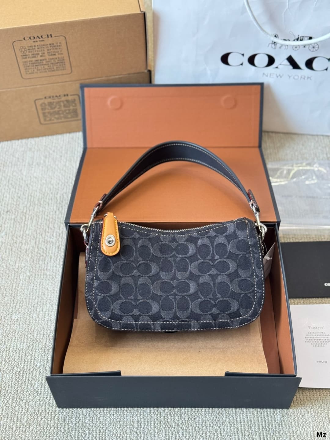 Coach Swinger In Signature Denim