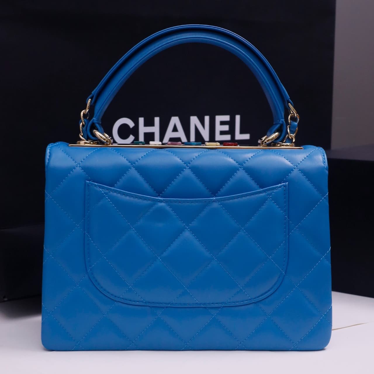 SMALL FLAP BAG WITH TOP HANDLE Lambskin Gold Metal Blue A