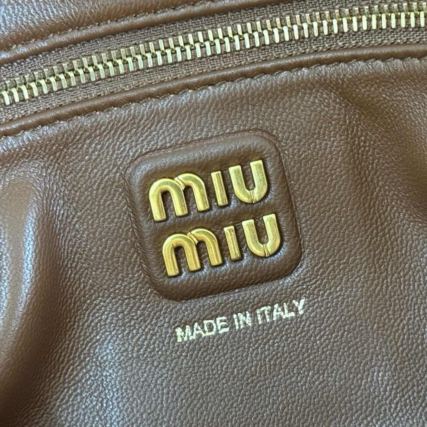 Miu Miu Caprice Tobacco python-print Ayers leather clutch 5BF130 TOP