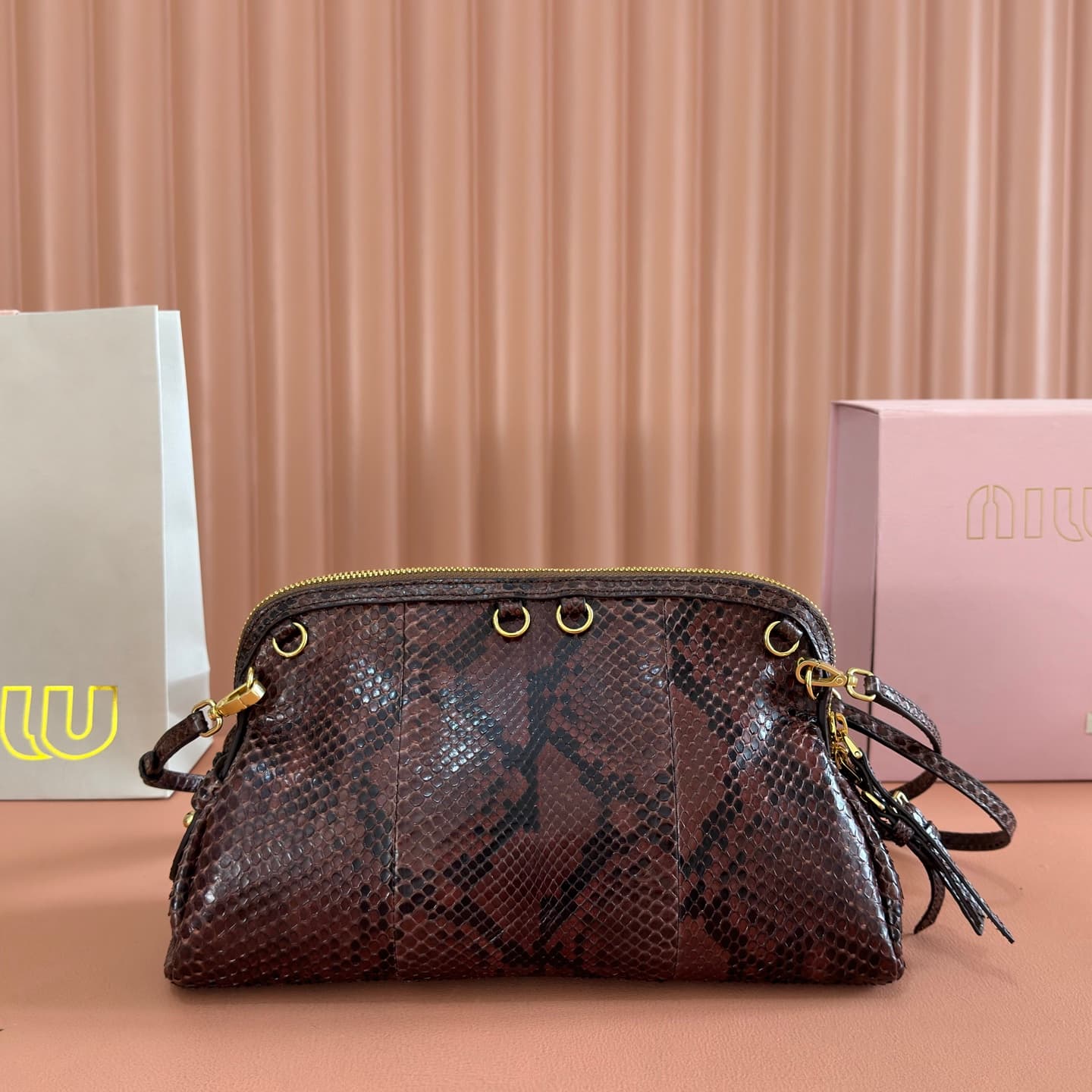 Miu Miu Caprice Tobacco python-print Ayers leather clutch 5BF130 TOP