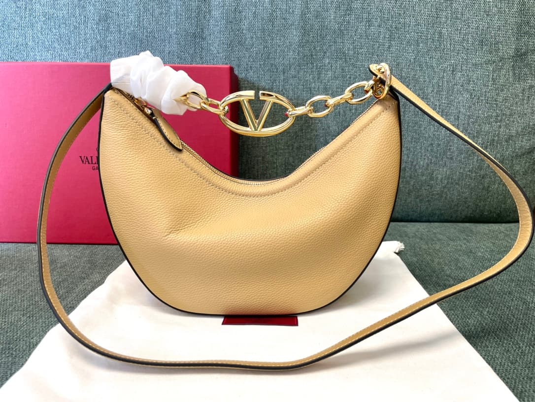 Valentino Garavani VLogo Moon small hobo bag in beige grained calfskin High