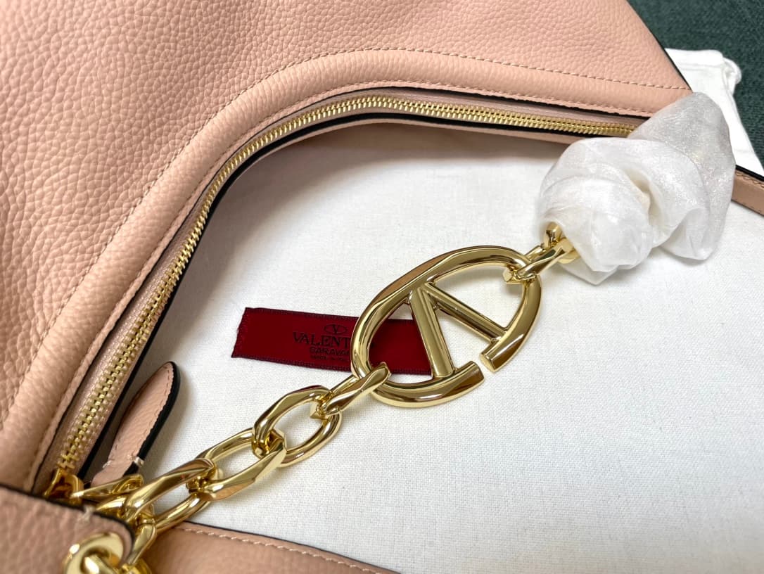 Valentino Garavani VLogo Moon small hobo bag in Light Pink grained calfskin High