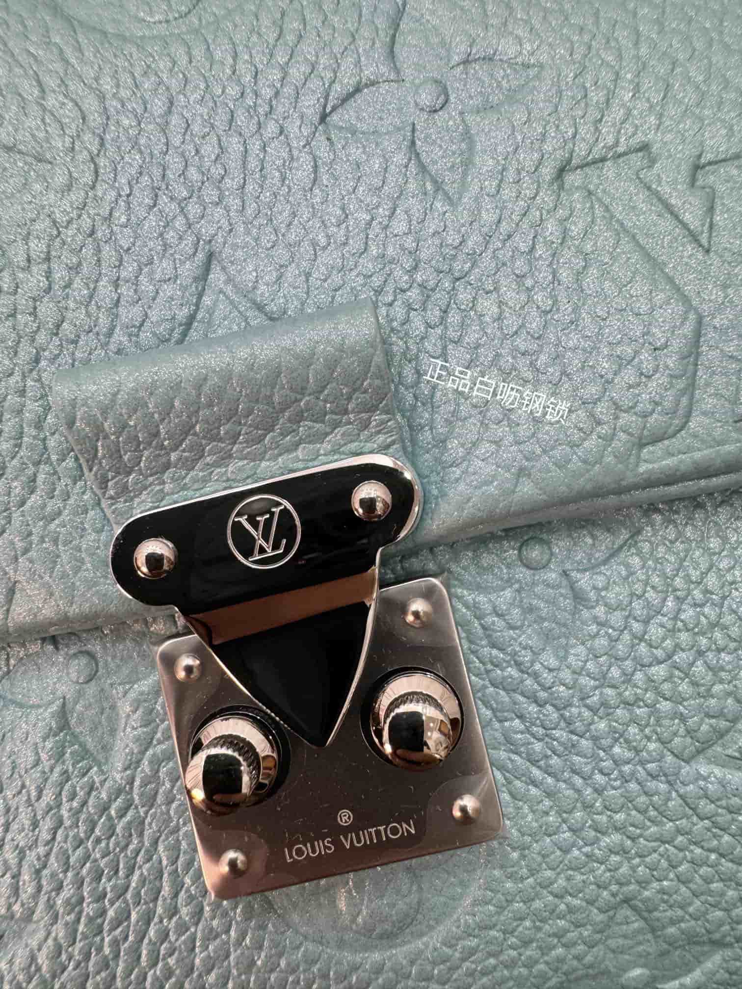 Louis Vuitton Madeleine Nano Embossed, grained cowhide leather M12211 Top