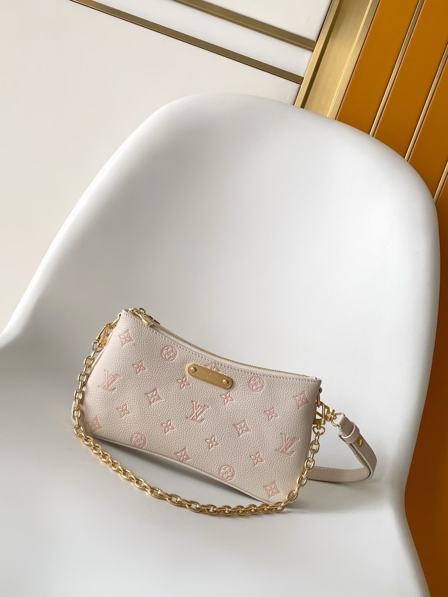 Louis Vuitton Pochette Liv Milky White/Peach Embossed grained cowhide leather M27741 High