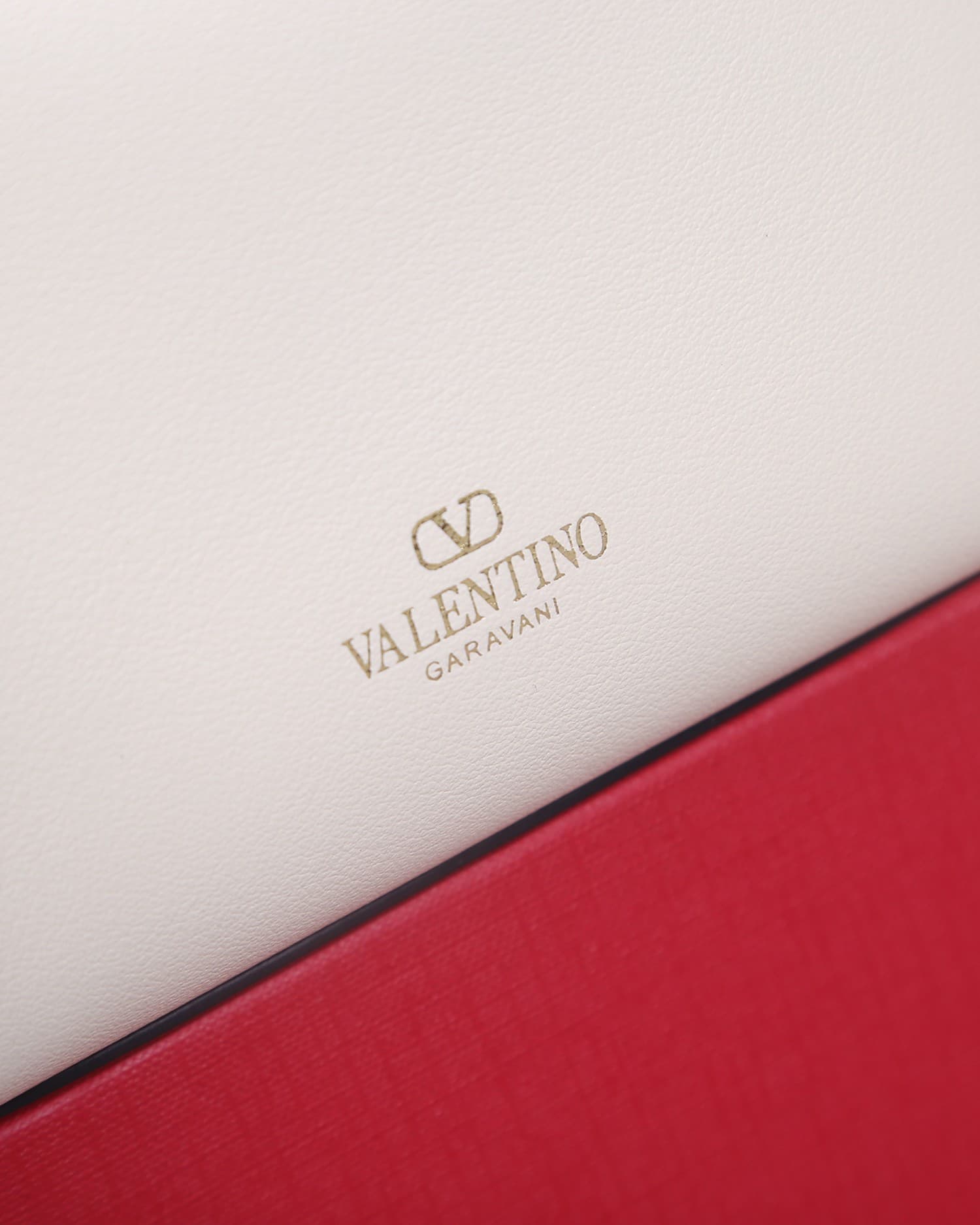 Valentino Garavani Locò calfskin leather bucket bag in white 22058 High