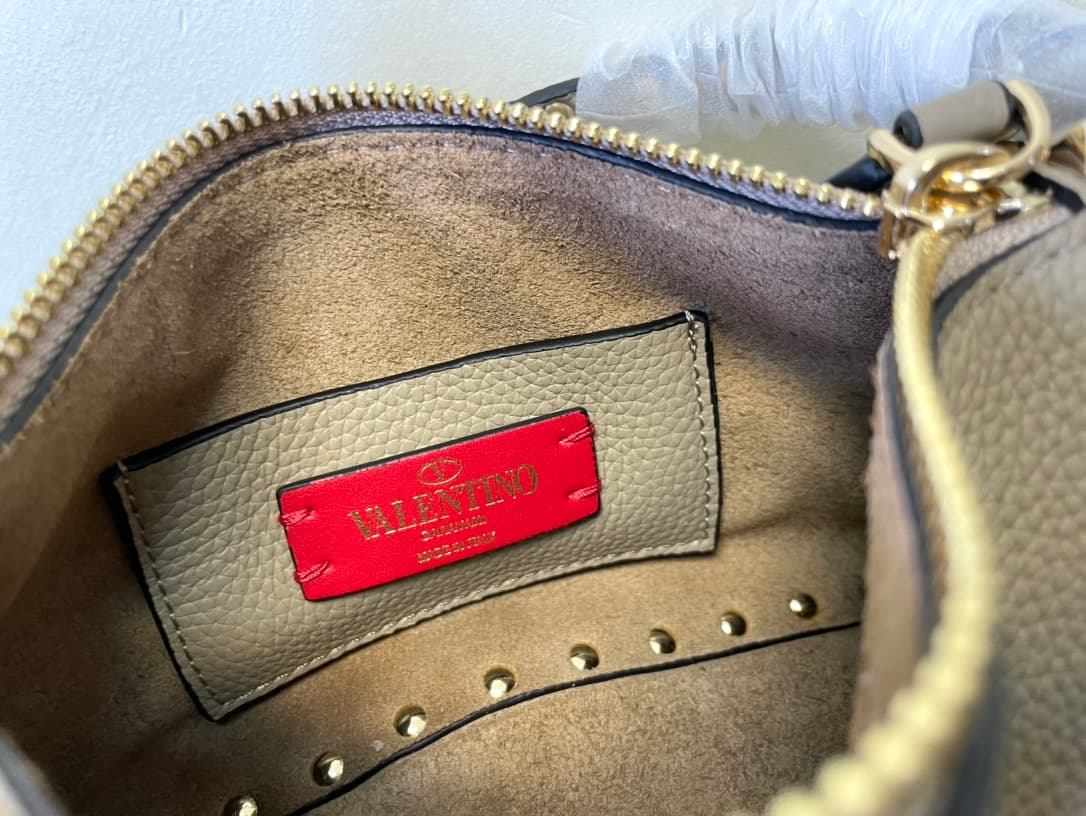 Valentino Garavani Mini Rockstud crossbody bag in Beige Grained Calfskin High