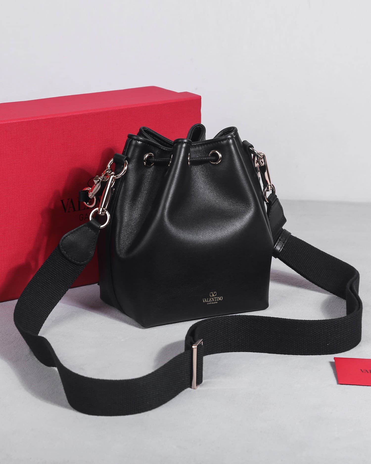 Valentino Garavani Locò calfskin leather bucket bag in black 22058 High