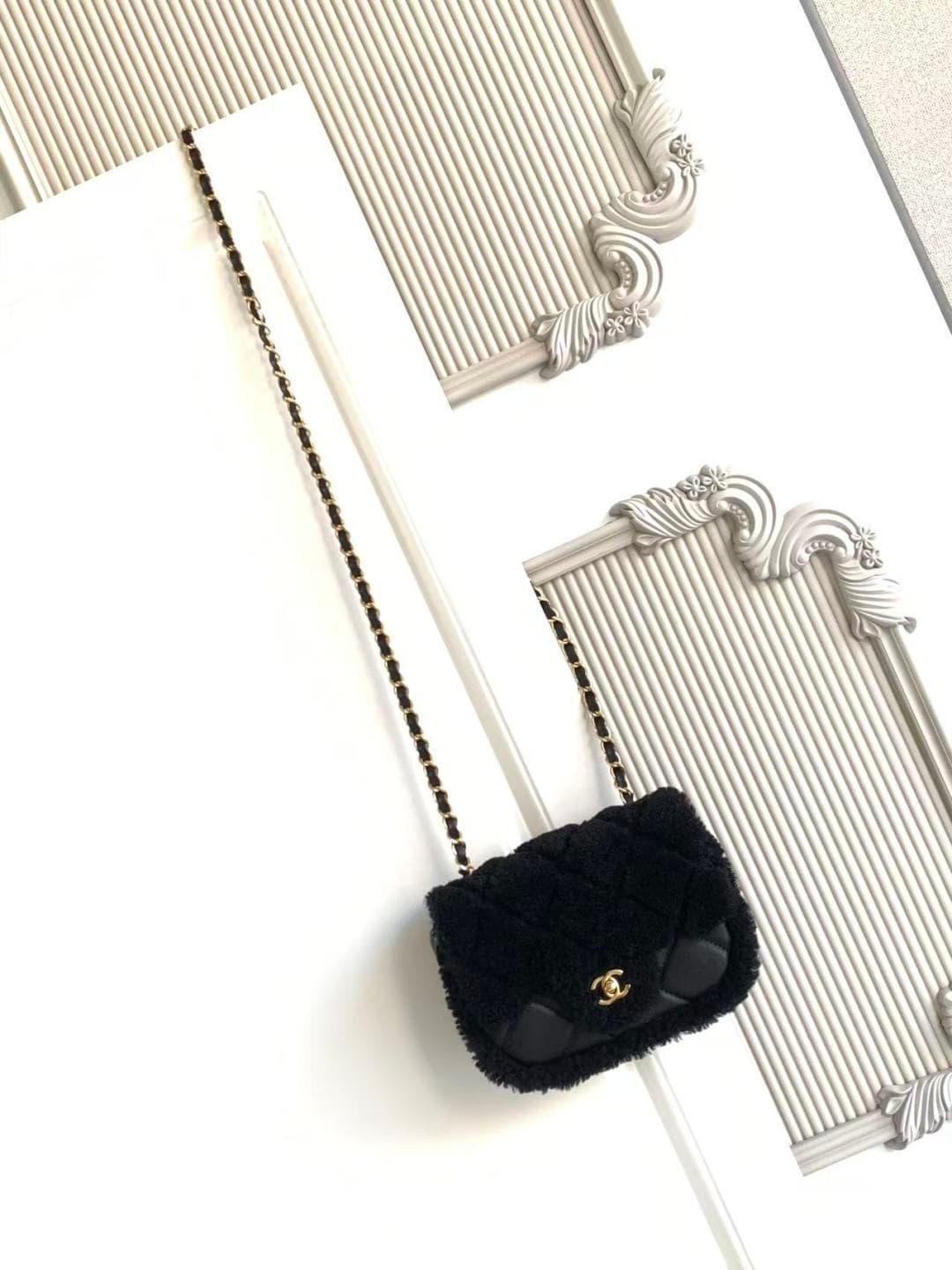 Chanel Mini Shearling Flap Bag in Black lambskin with black shearling & Gold-Tone Metal AS5148 A