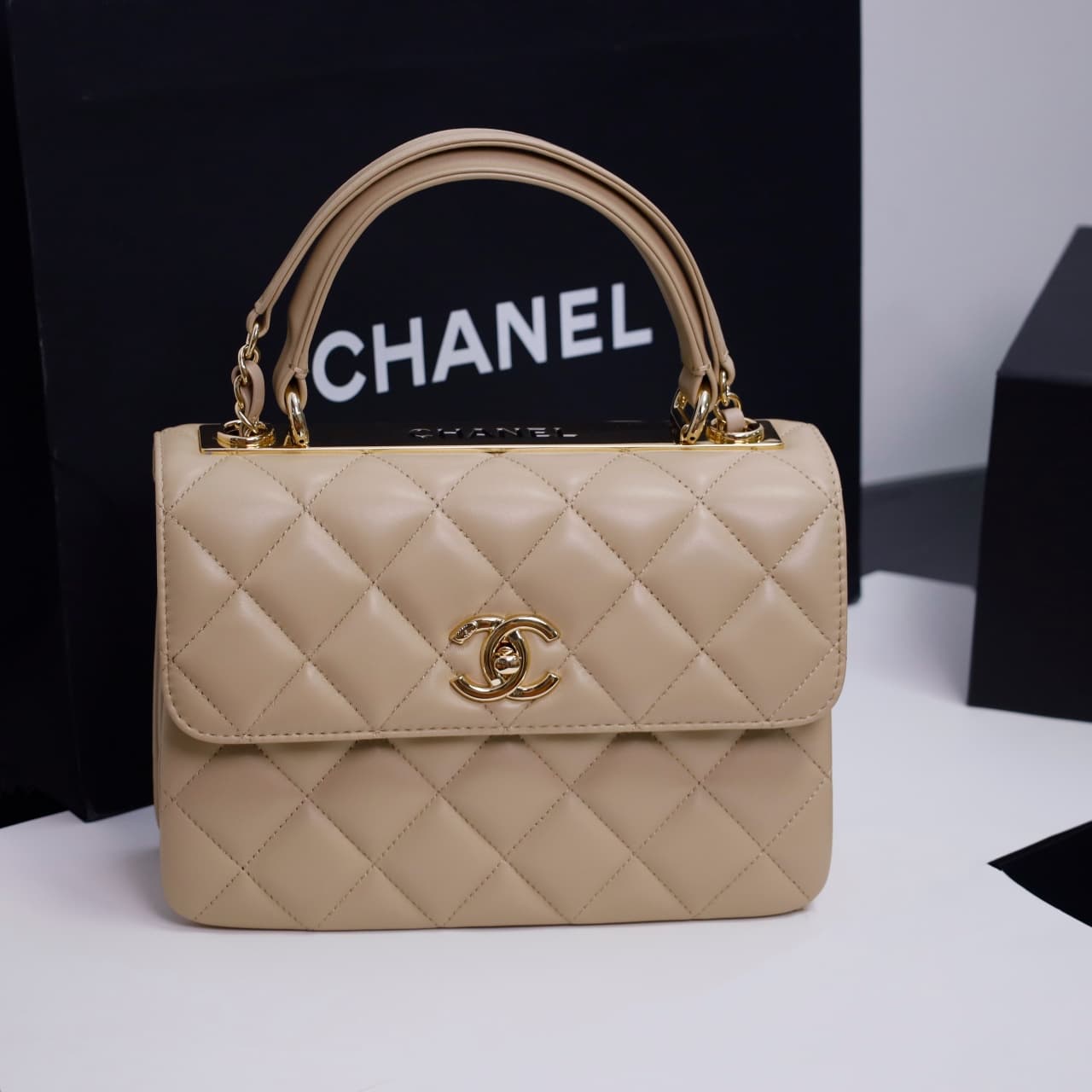 SMALL FLAP BAG WITH TOP HANDLE Lambskin Gold Metal Beige A