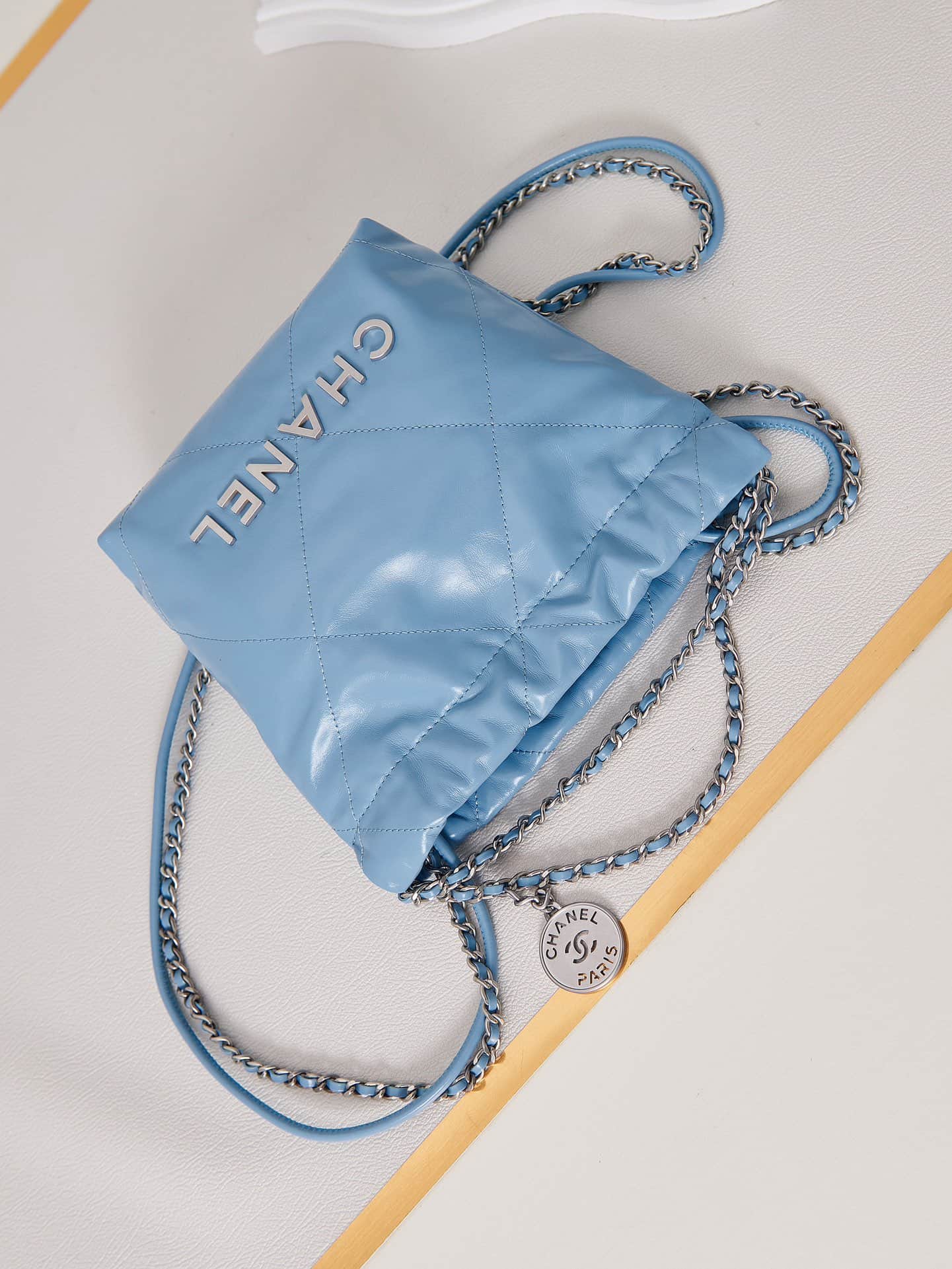 Chanel 22 MINI HANDBAG Shiny Calfskin Blue & Silver-Tone Metal AS3980 A