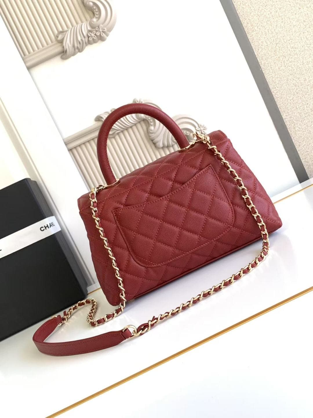 FLAP BAG WITH TOP HANDLE Grained Calfskin & Gold-Tone Metal A92990 Red Binding A