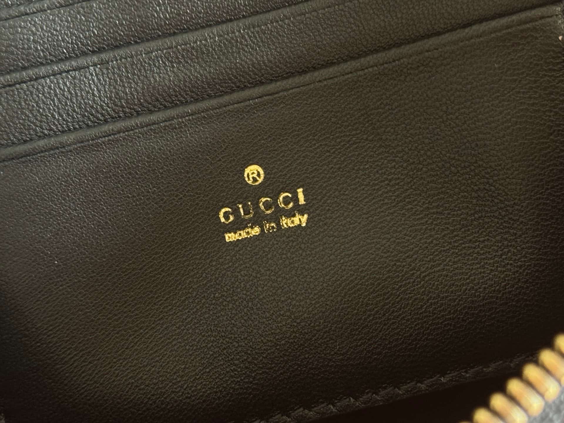 Gucci GG Marmont pouch with strap Black vertical matelassé nappa leather A006X2 High