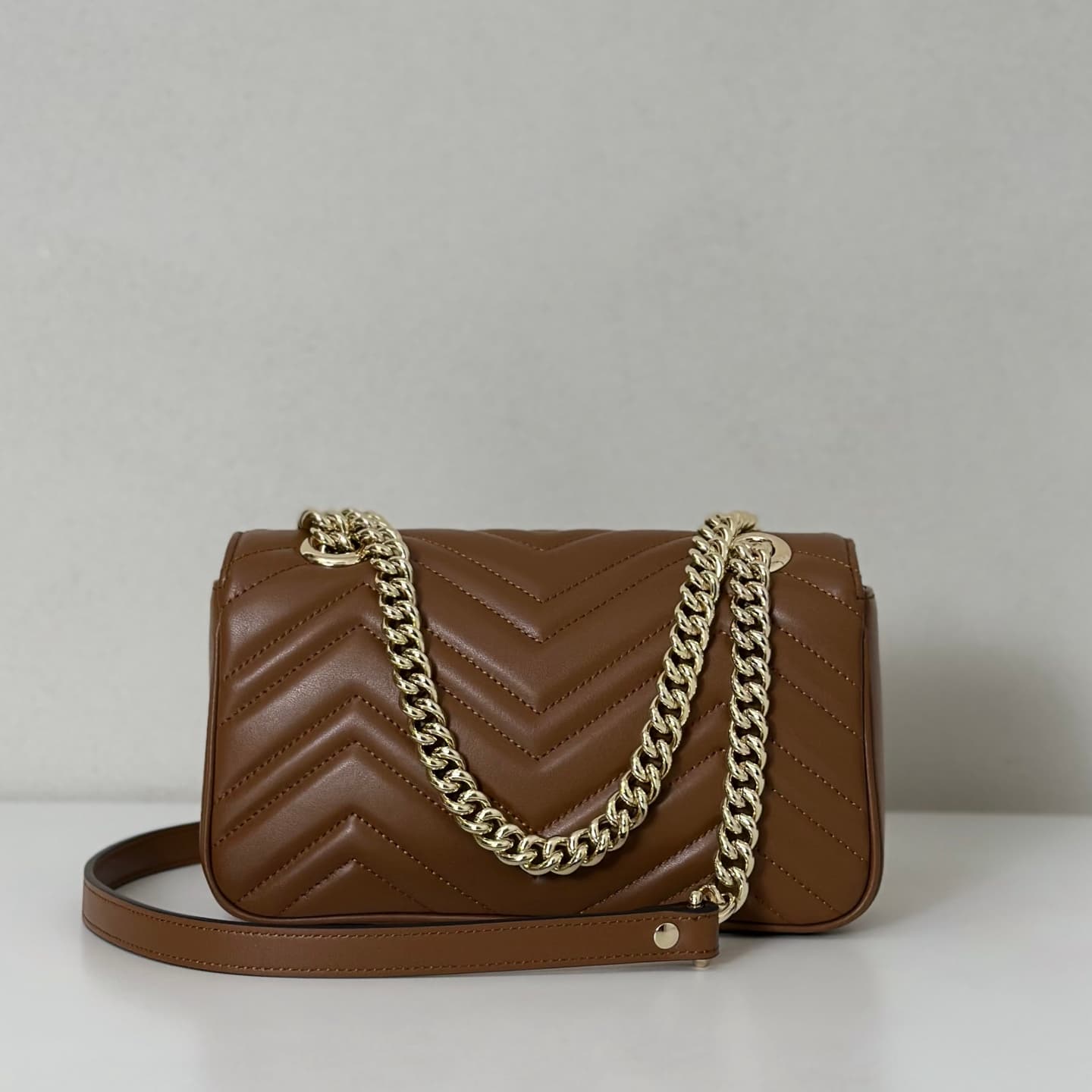 GG Marmont mini matelassé shoulder bag brown leather 446744 high