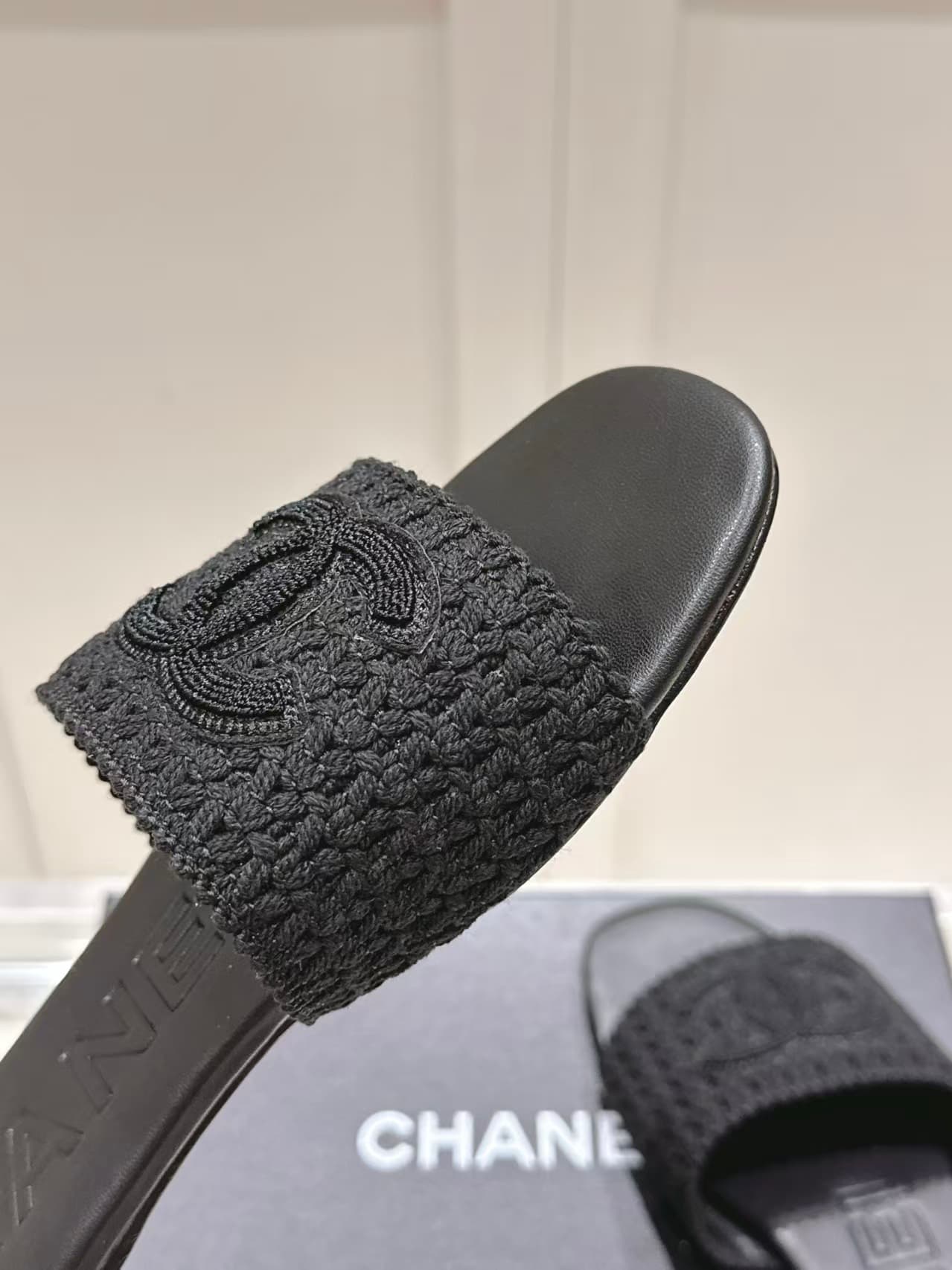 Chanel black crochet CC mules