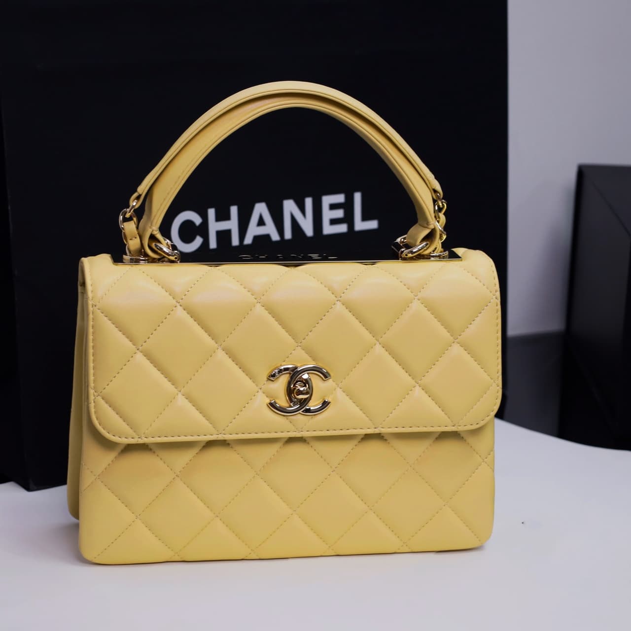SMALL FLAP BAG WITH TOP HANDLE Lambskin Gold Metal yellow A