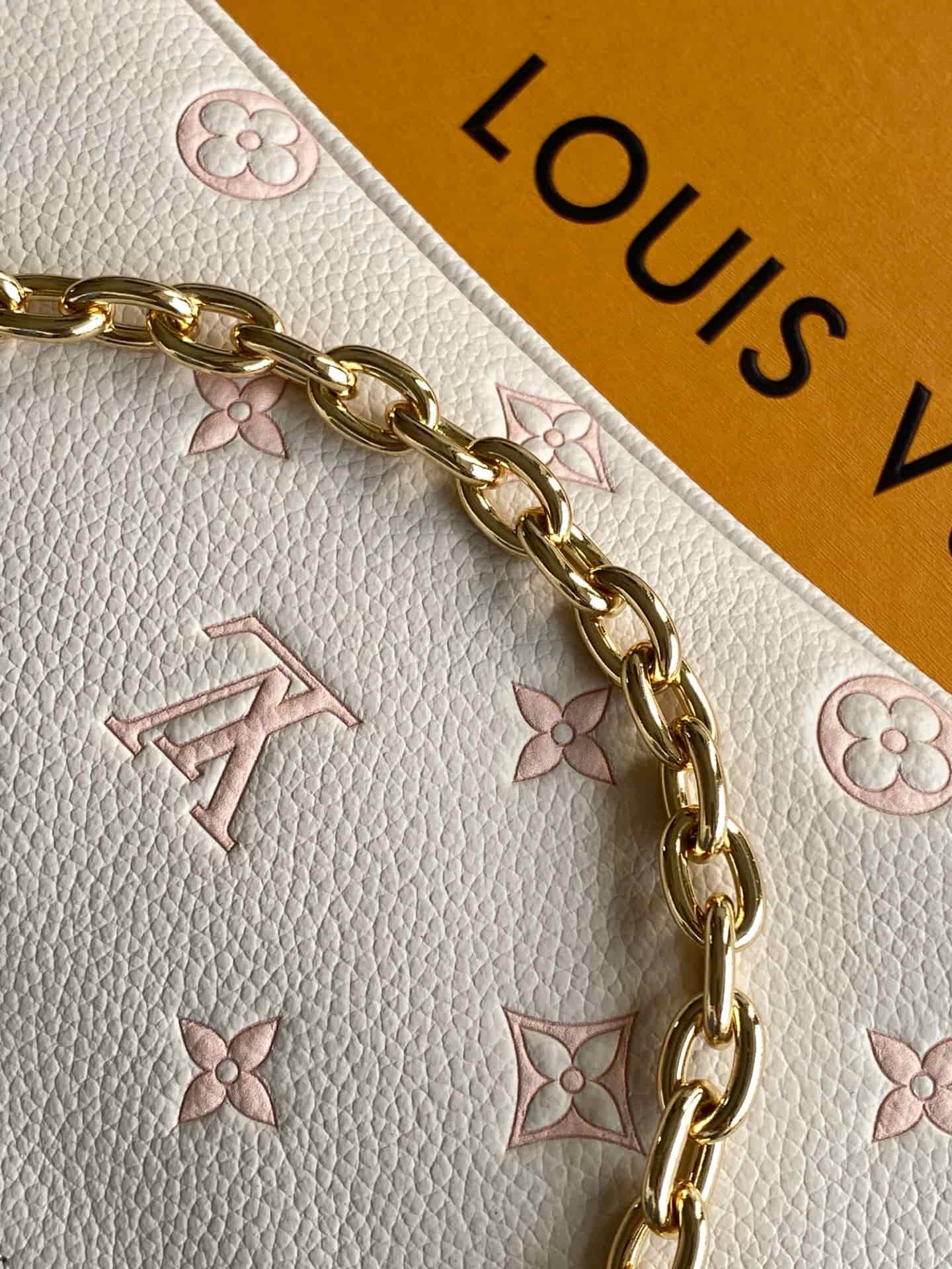 Louis Vuitton Pochette Liv Milky White/Peach Embossed grained cowhide leather M27741 High
