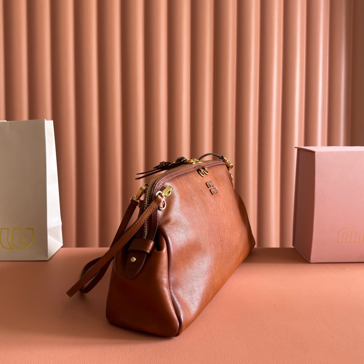 Miu Miu Caprice Calfskin leather clutch Cognac 5BF133