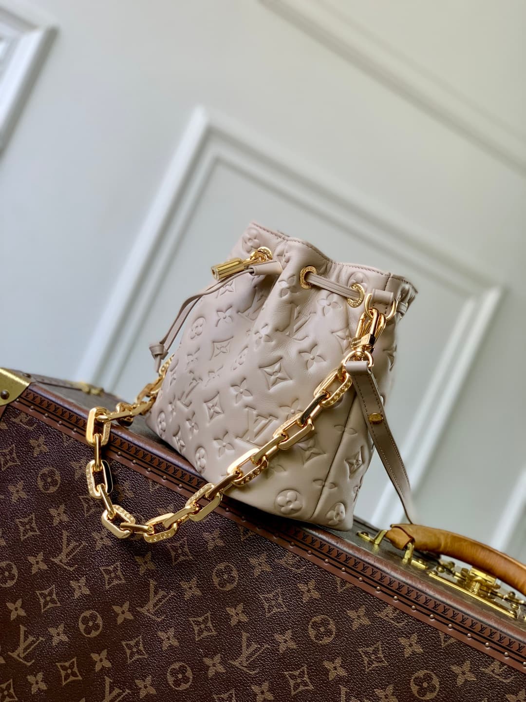 Louis Vuitton Coussin Bucket bag Monogram-embossed lambskin M26530 beige high