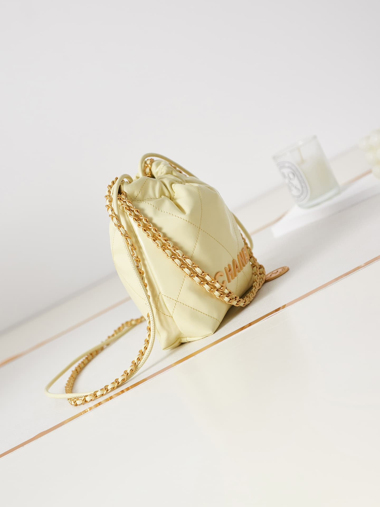Chanel 22 MINI HANDBAG Shiny Calfskin Light Yellow & Gold-Tone Metal AS3980 A