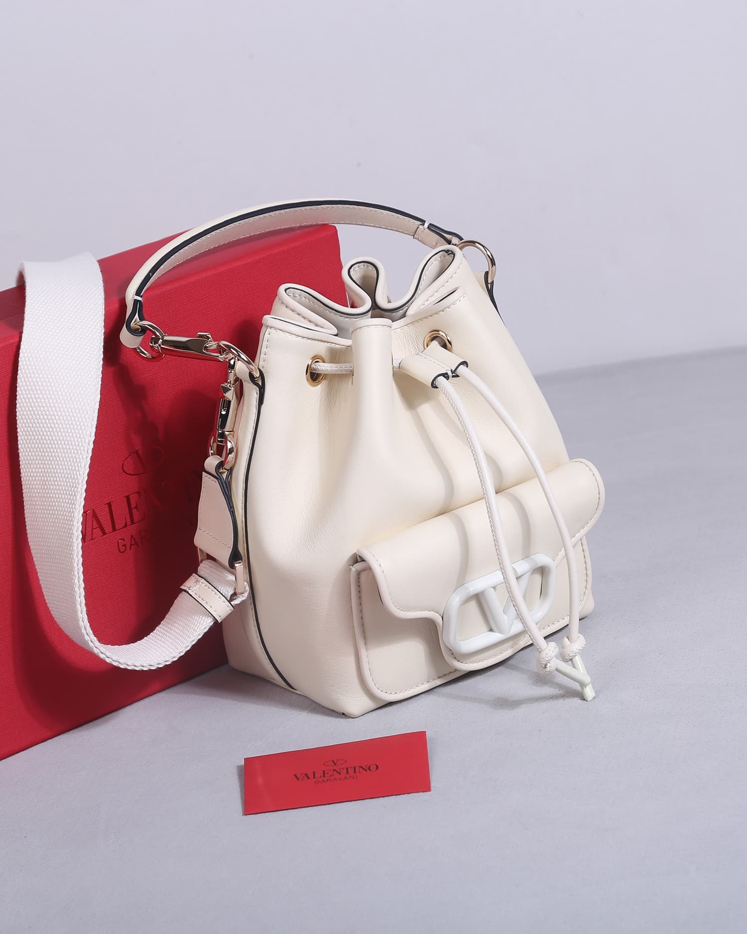 Valentino Garavani Locò calfskin leather bucket bag in white 22058 High
