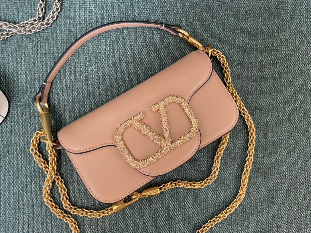 Valentino Garavani Locò Mini leather shoulder bag with crystal VLogo High
