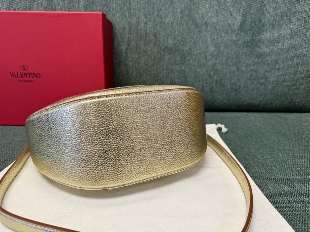 Valentino Garavani VLogo Moon small hobo bag in Gold grained calfskin High