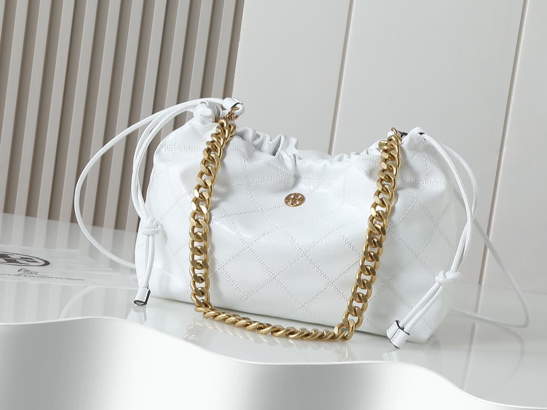 Tory Burch Large Willa Quilted Smooth Leather E/W Drawstring Bag in white high