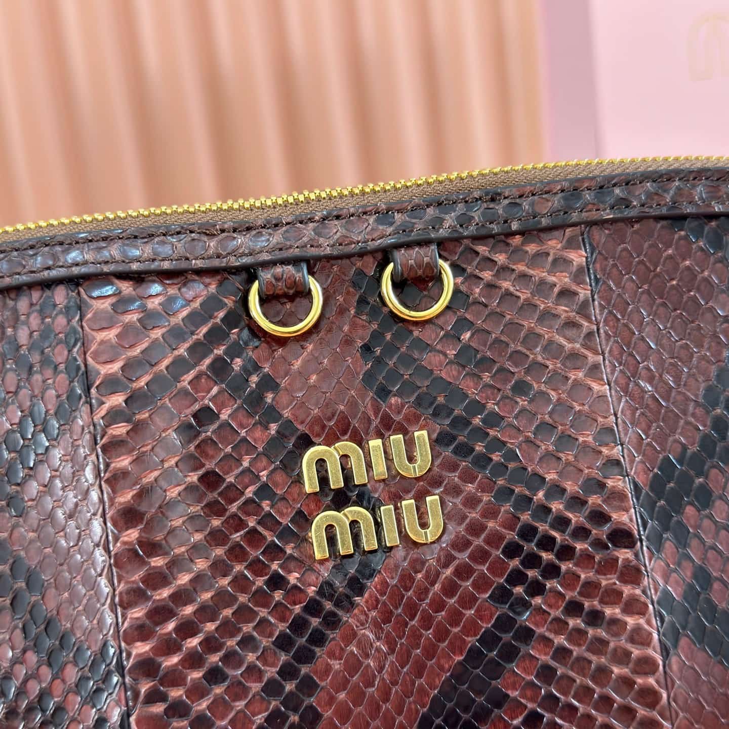 Miu Miu Caprice Tobacco python-print Ayers leather clutch 5BF130 TOP