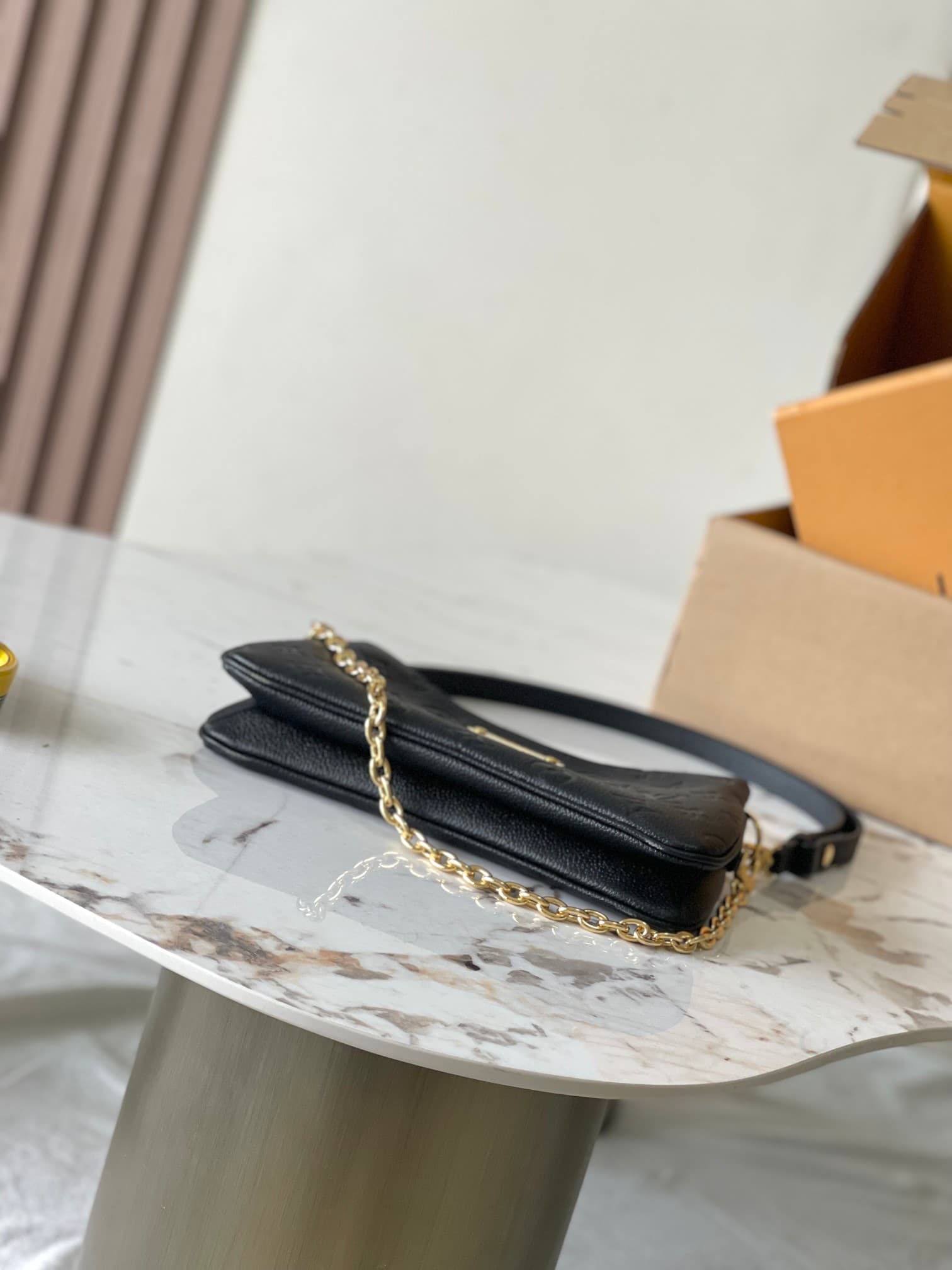 Louis Vuitton Pochette Liv Black Monogram Empreinte embossed supple grained cowhide leather M83301 TOP