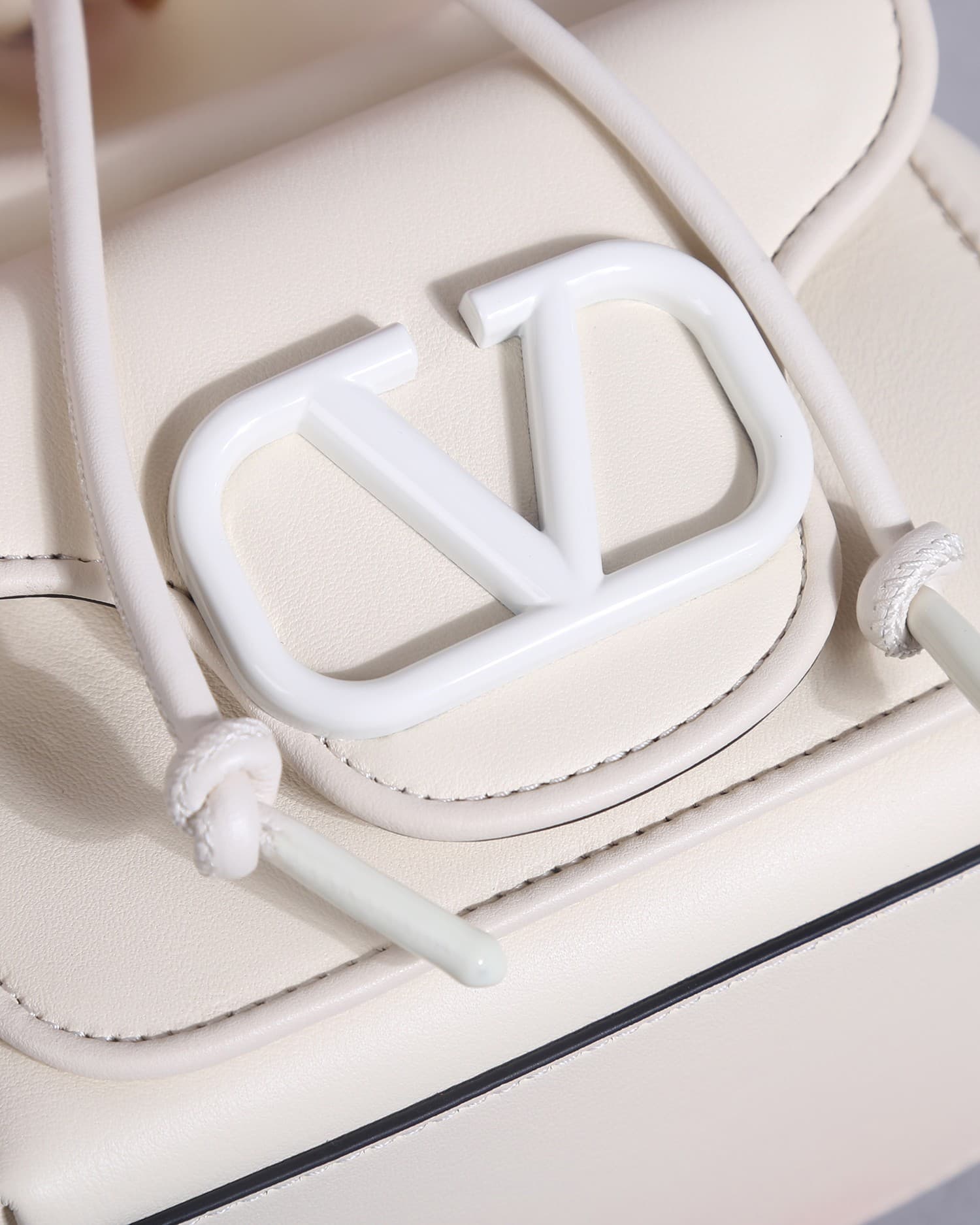 Valentino Garavani Locò calfskin leather bucket bag in white 22058 High
