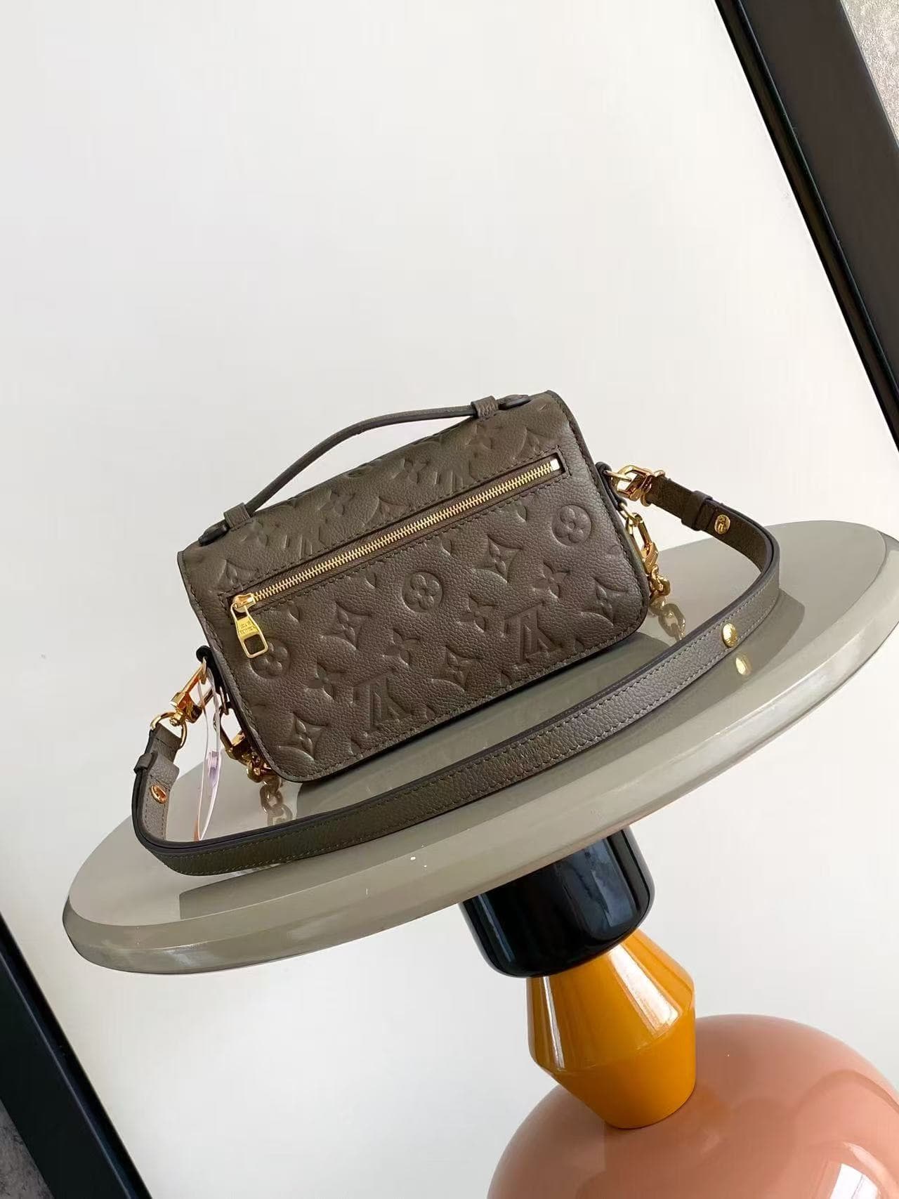 Louis Vuitton Pochette Metis East West Smoke Monogram Empreinte Leather M25910 TOP