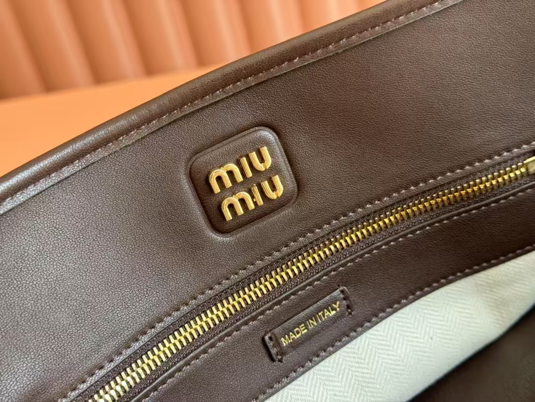 Miu Miu Aventure nappa leather Medium bag in Briarwood Top