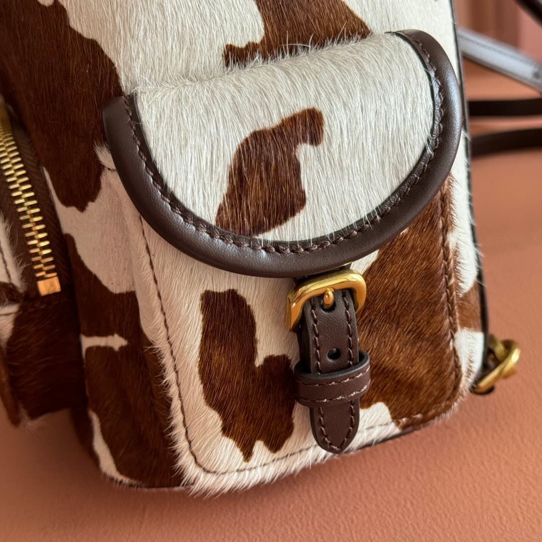 Miu Miu Calf Hair Backpack in brown and white cow print 5BZ043 TOP
