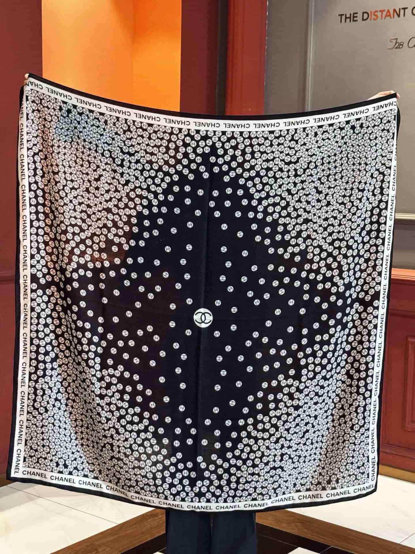 Chanel silk scarf featuring polka dot pattern