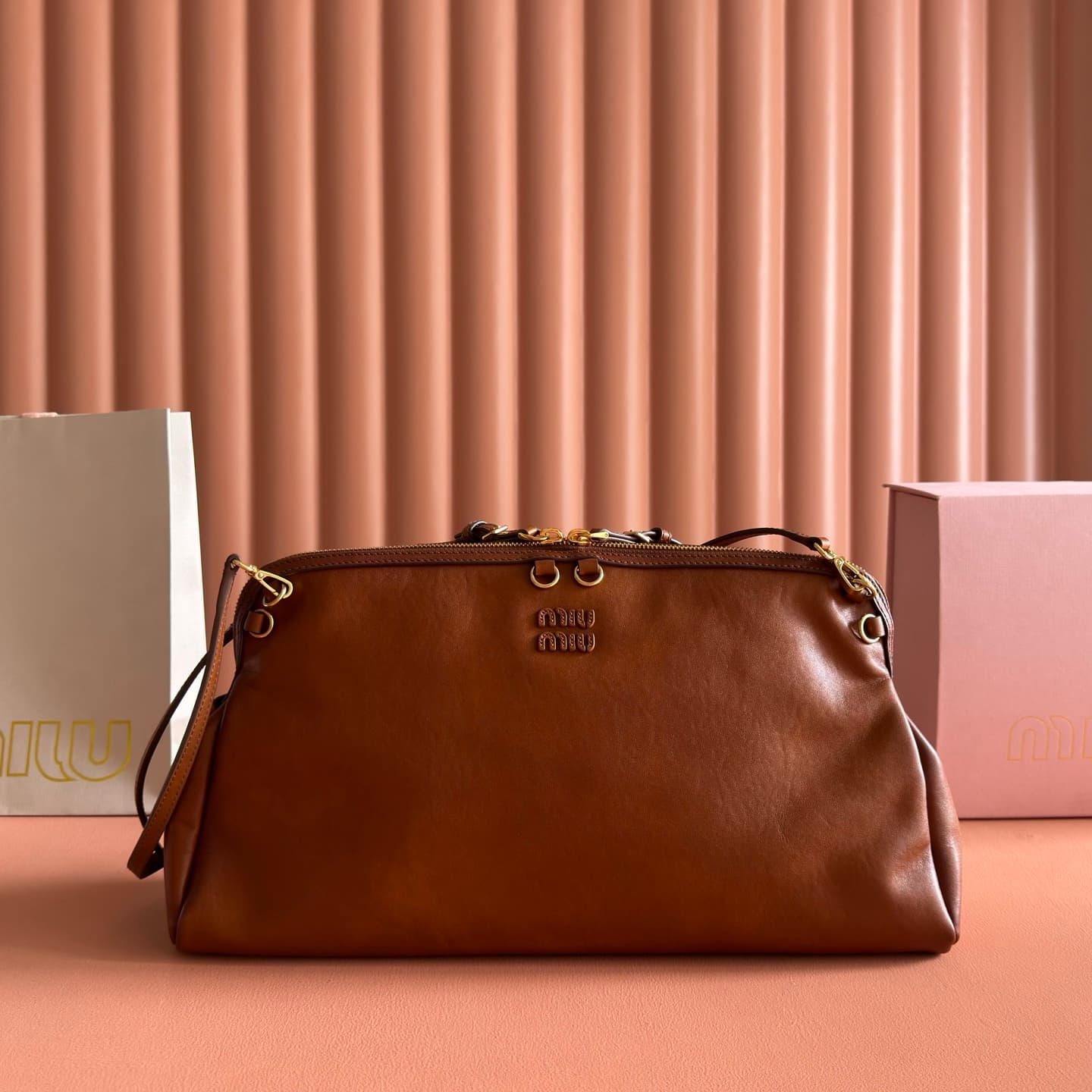 Miu Miu Caprice Calfskin leather clutch Cognac 5BF133