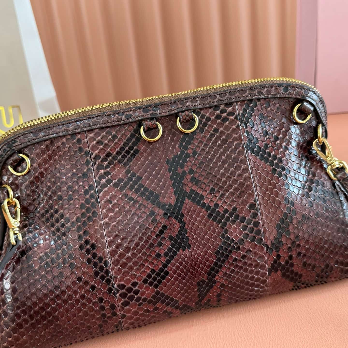 Miu Miu Caprice Tobacco python-print Ayers leather clutch 5BF130 TOP
