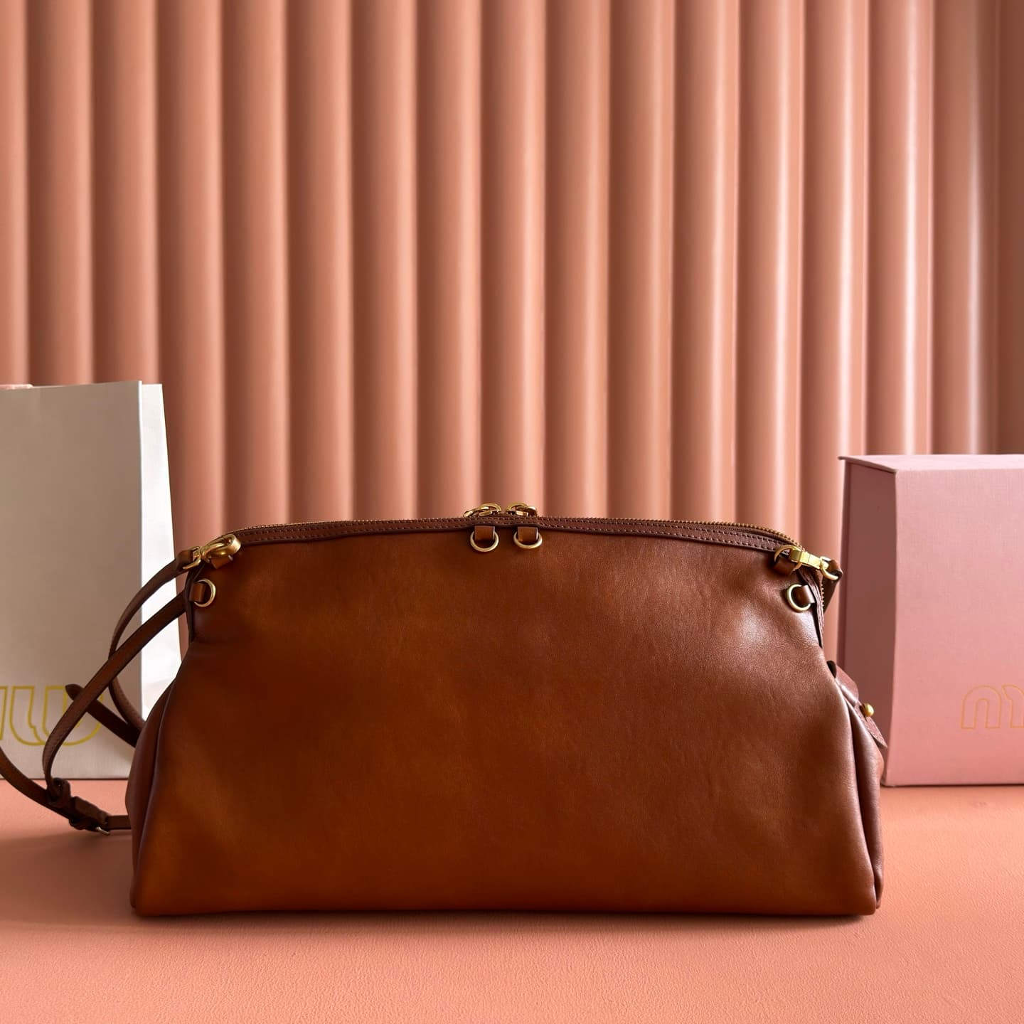 Miu Miu Caprice Calfskin leather clutch Cognac 5BF133