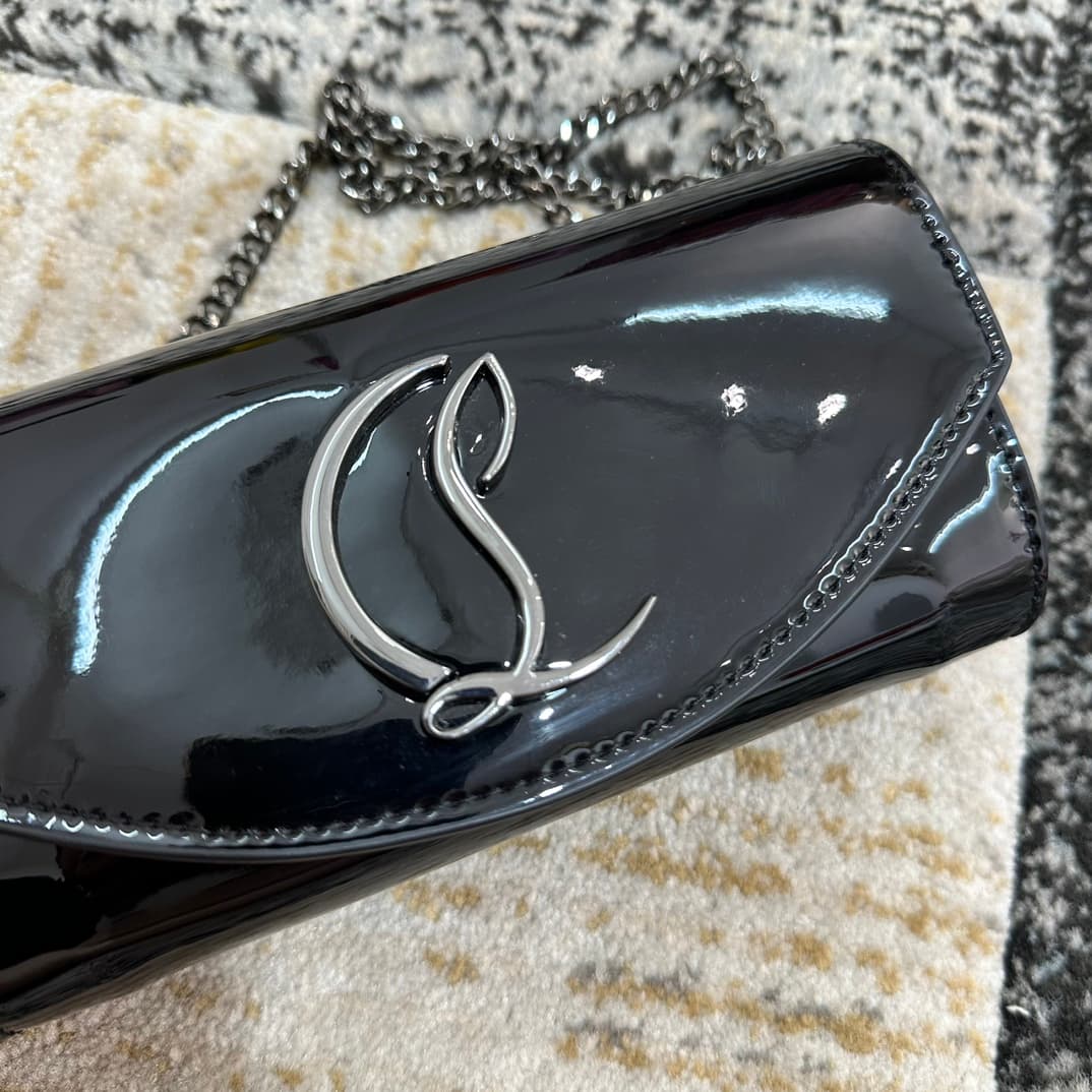 Christian Louboutin Loubi54 patent leather shoulder bag in black High