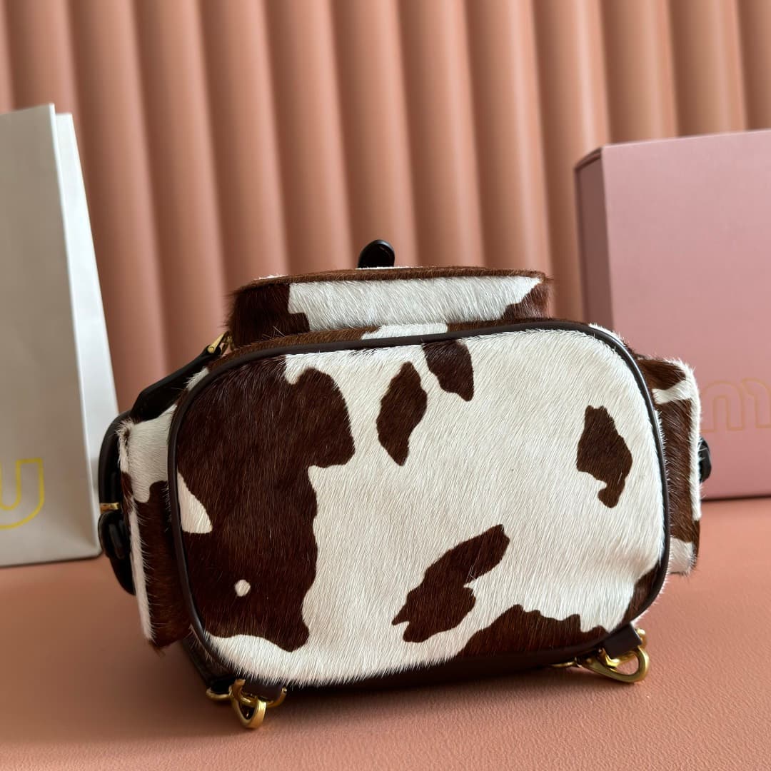 Miu Miu Calf Hair Backpack in brown and white cow print 5BZ043 TOP