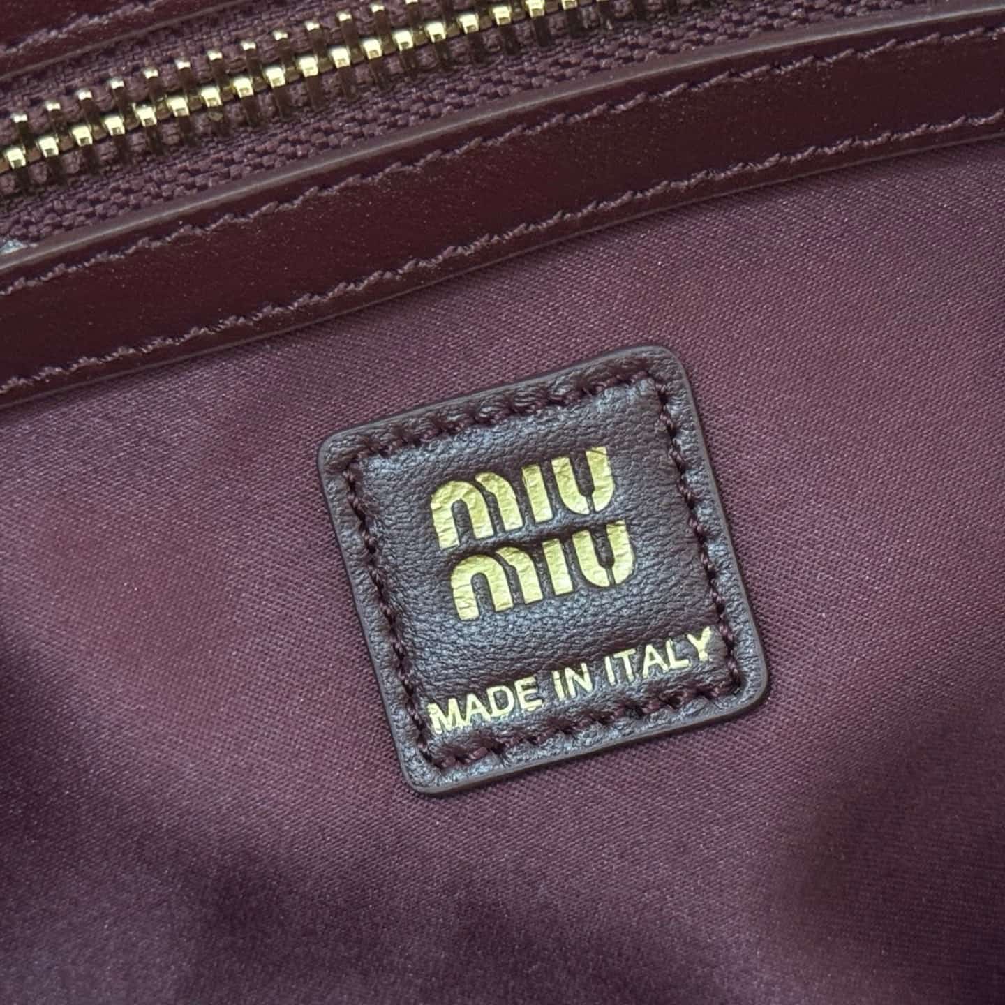 Miu Miu Caprice matelassé nappa leather clutch Burgundy TOP
