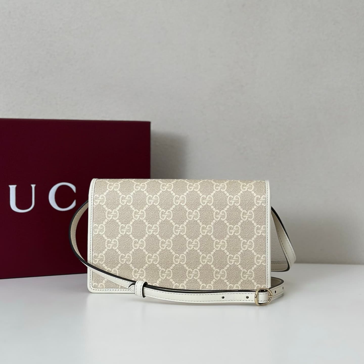 Gucci GG Emblem wallet beige and white fabric with leather strap 820688 High