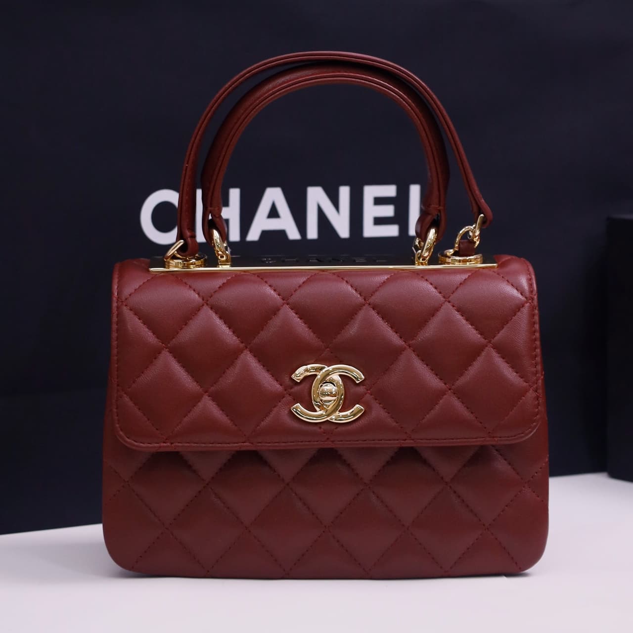Chanel MINI FLAP BAG WITH TOP HANDLE AS4654 Lambskin &Gold-Tone Metal Brown A