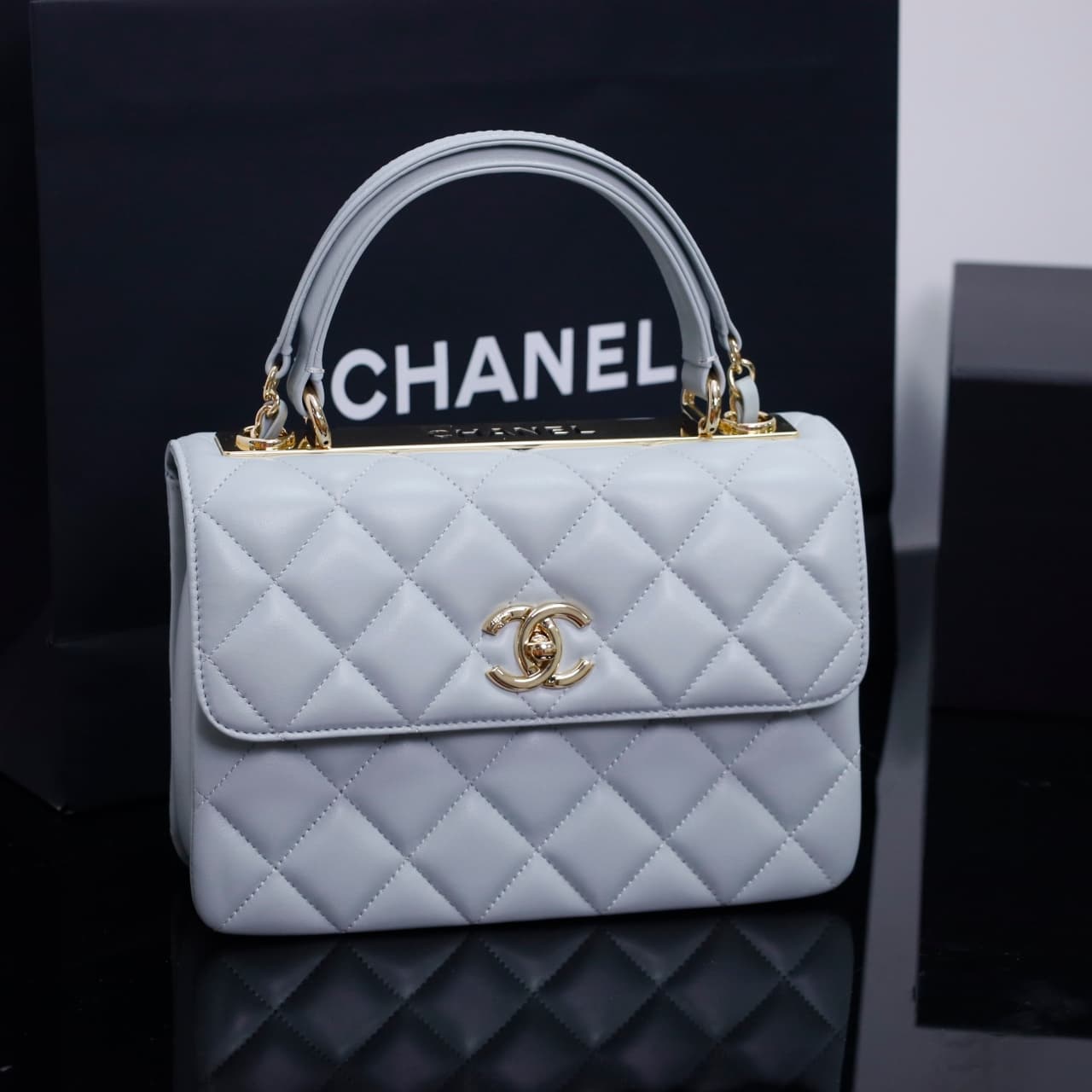 SMALL FLAP BAG WITH TOP HANDLE Lambskin Gold Metal Light Blue A
